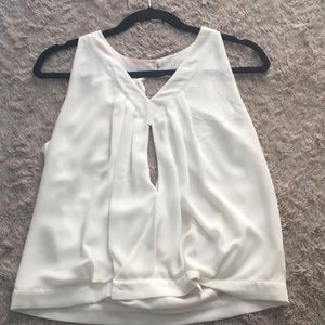 A white top with a slit down the middle